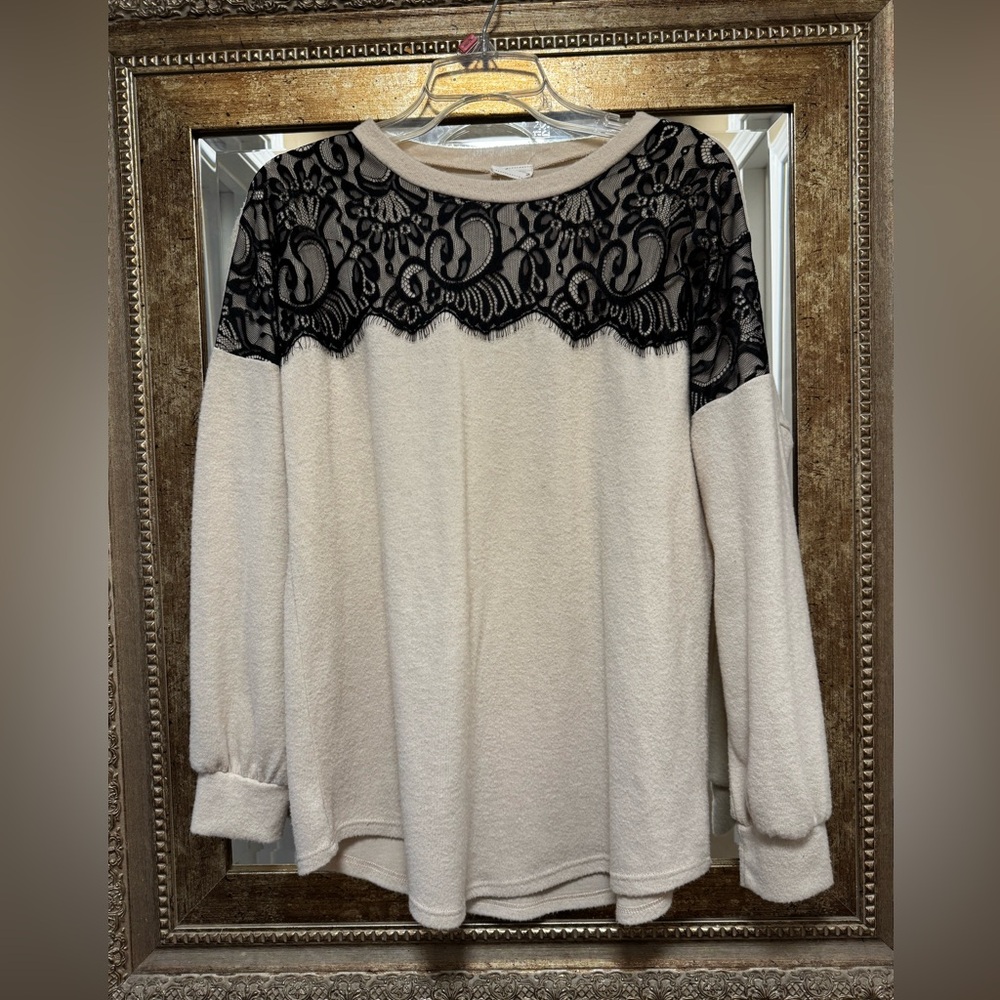 Beige sweater with black lace